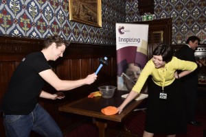 Alison Thewliss is hammered by an assistant to celebrate the Royal Society of Chemistry's 175th Anniversary